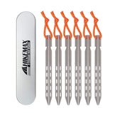Hikemax ultralight titanium tent stakes in a 6-pack for backpacking.