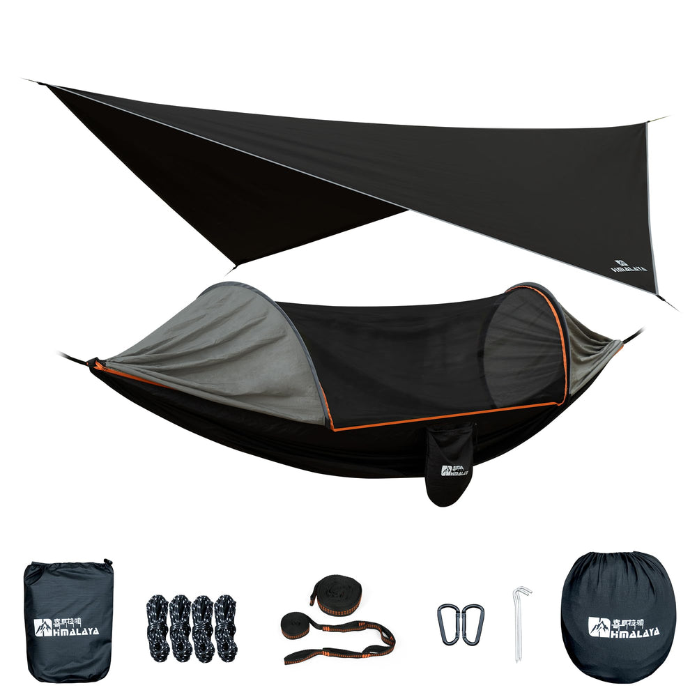 Himalaya hammock with rain fly tarp shows weather-ready camping setup