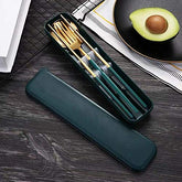HonHeam tableware box in golden-green keeps your set organized for travel.