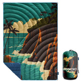 Hotkoko camping blanket packed in its compact bag for ultra-portable outdoor comfort.
