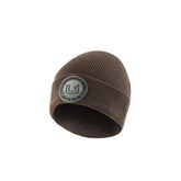 HUK embossed beanie close-up showing soft knit warmth for cold weather adventures