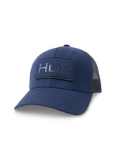HUK mens trucker hat with embossed Naval Academy logo for all-day comfort on the water.