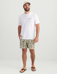 HUK Next Level Camp Short in action during fishing with breathable design.