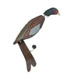 HuntEmUp pheasant dummy closeup highlights texture aiding scent-guided exploration