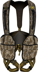 Hunter Safety System Hybrid Harness with ElimiShield in Mossy Oak Bottomland—scent control and versatile pockets.
