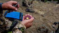 Carlton's Calls elk diaphragm call handheld view highlighting compact design for field versatility