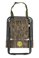 Dove Chair seat in Mossy Oak New Bottomland offers cushioned comfort during waits.