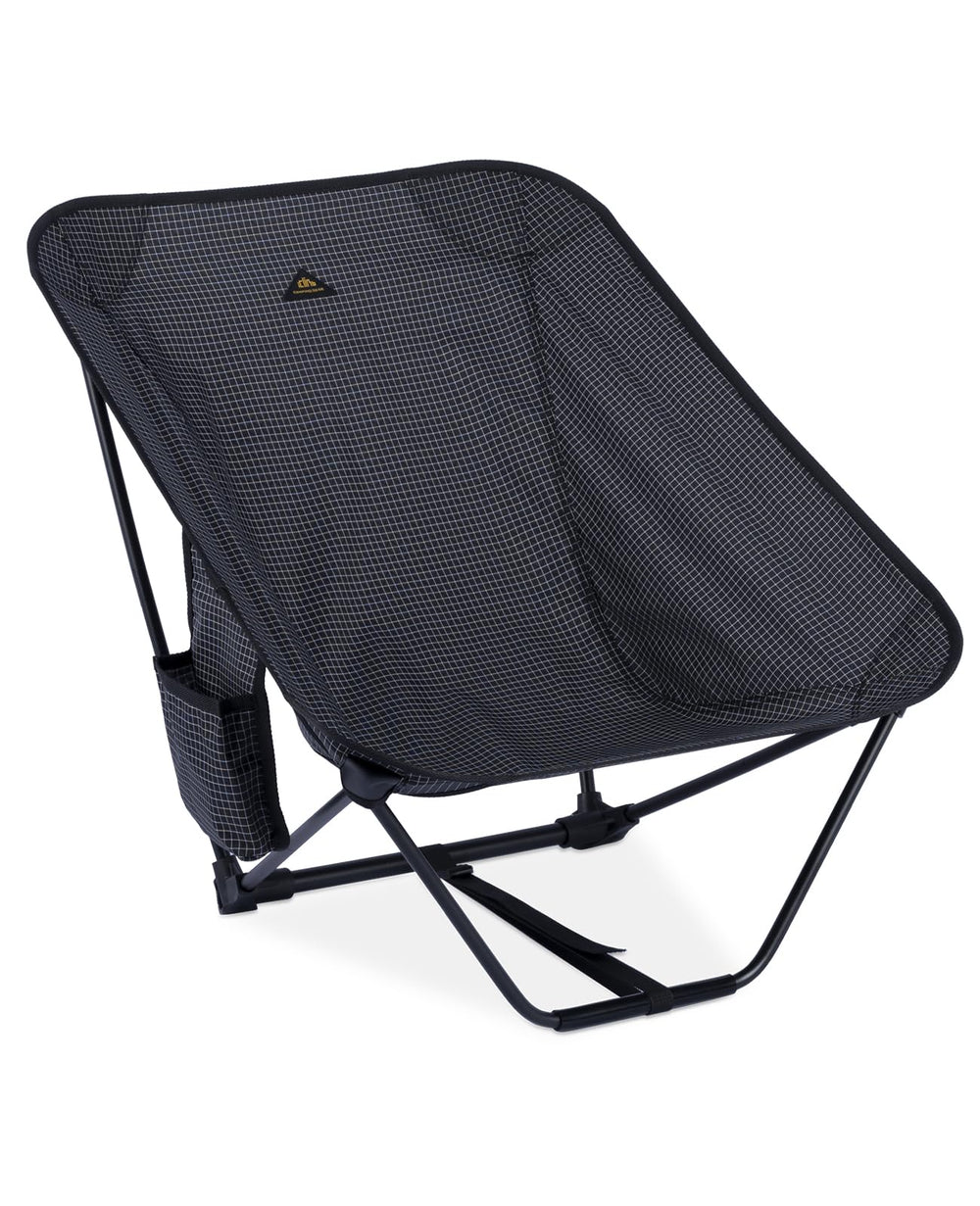 iClimb low ultralight camping chair setup demonstrates stable seating on a trail