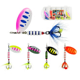 Inline spinner bait set in a tackle box for trout