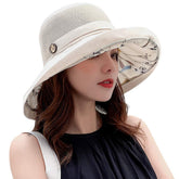INOGIH women's summer wide-brim hat at the beach provides stylish sun protection.