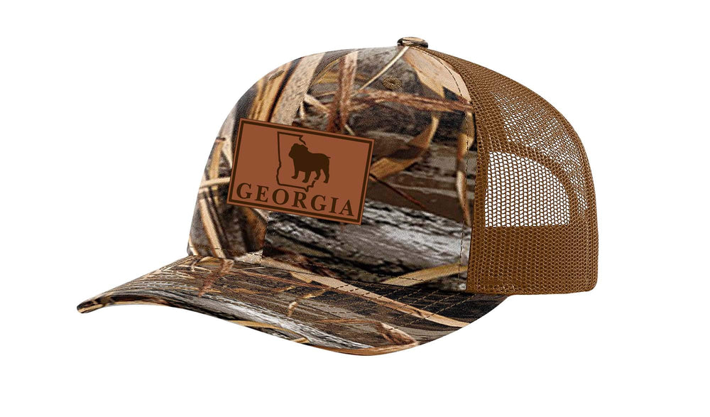 It's All About the South Georgia Bulldog laser-engraved leather patch trucker hat for outdoor wear.