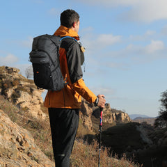 IX INOXTO hiking backpack with rain cover storage keeps gear dry during downpour