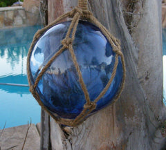 Royal blue Japanese glass fishing float with natural jute rope - front view