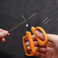 Spring clip keychain attached to orange handle