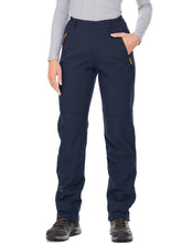 Jessie Kidden women's waterproof pants front view showing dry warmth in wet conditions