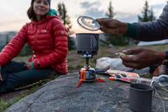 Jetboil Stash FluxRing cookpot highlights fast heating for quick meals.