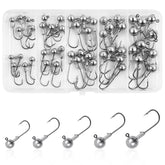 Unpainted round-ball jig heads in a storage box