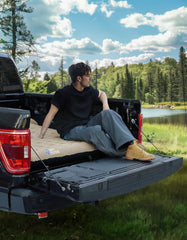 JOYTUTUS Upgraded Light Truck Bed Air Mattress camel side profile shows durable construction for camping.