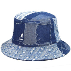 Close-up of distressed two-tone denim fabric on Kangol hat