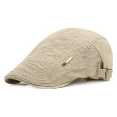 Katutude newsboy cap in beige offers breathable cotton for daily comfort and sun protection.
