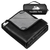 KawaGebo Kamp fleece blanket on campsite keeps you dry on damp ground.