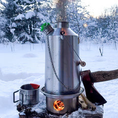 Kelly Kettle whistle indicates boil readiness during outdoor cooking