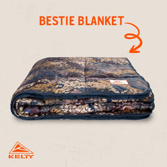 Kelty Bestie Blanket Chaparral back view highlights soft brushed interior for evening relaxation.