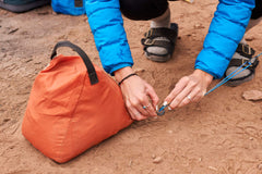 Kelty Sand Bag Stake with 20lbs capacity anchors tents on windy days.