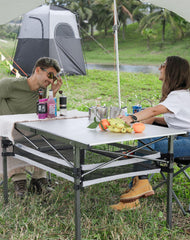 KingCamp folding table folded compact in carry bag for transport.
