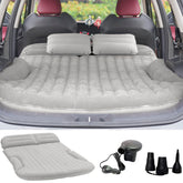KMZ SUV Air Mattress setup in car trunk with light-gray surface for comfortable rest.