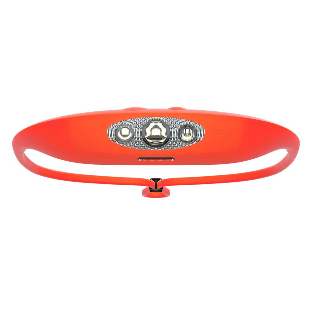 KNOG Bandicoot 250 headlamp on head in coral for hands-free outdoor lighting