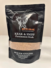 Krak & Sniff Buck Krak bottle pour demonstrates aroma booster for attracting deer.