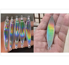 KTGCOZS foil pressing onto lure shows secure adhesion.