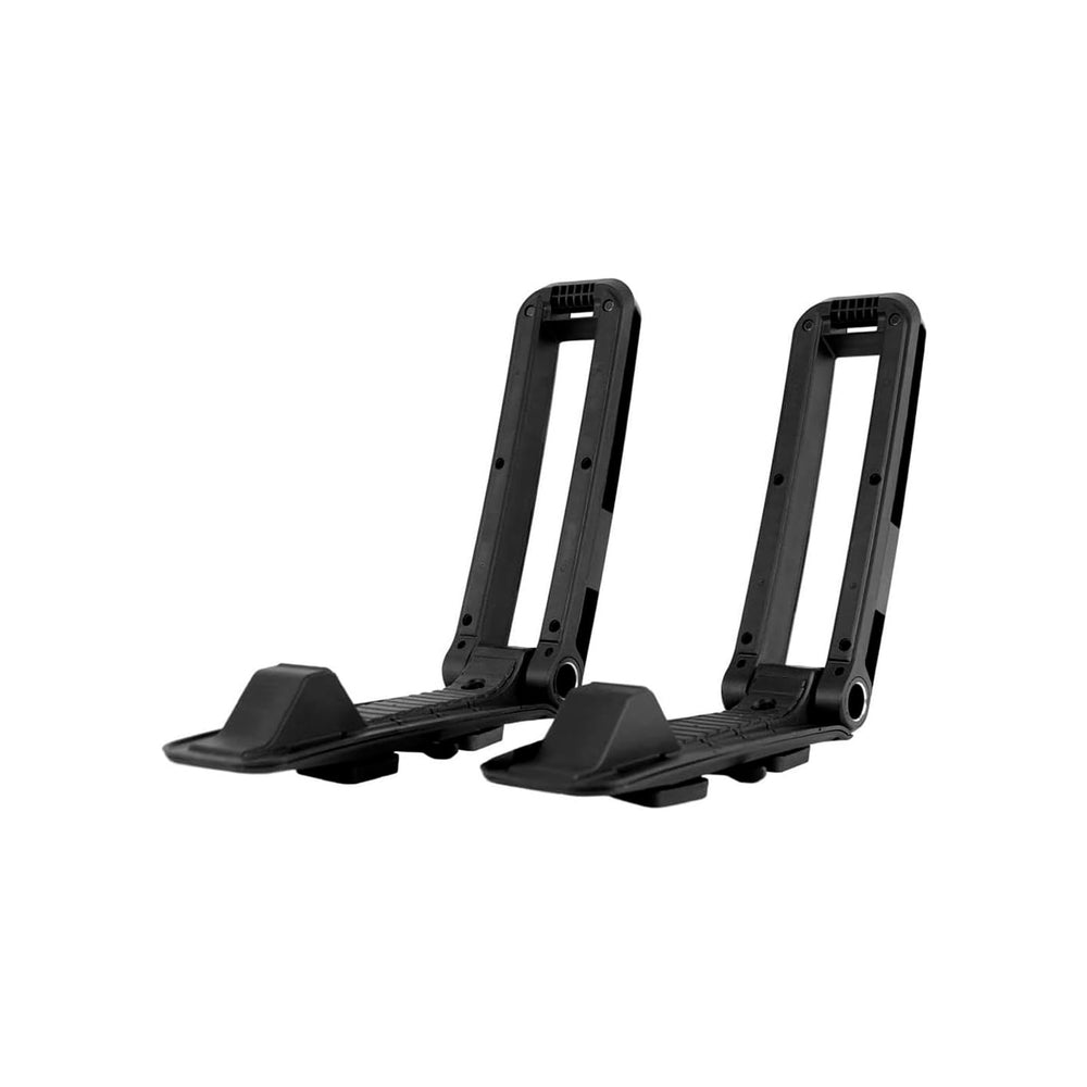 KUAT Class 4 V2 folding J-style kayak rack on roof crossbars for secure transport.