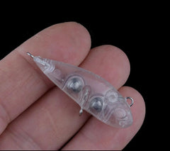 Lagnlnaoy blank lures stacked, ready for painting and multiple fishing trips.