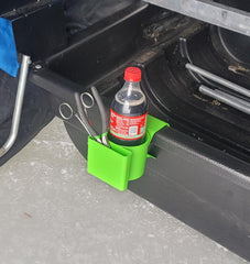 Holder securely attached to a 5-gallon bucket