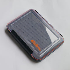 Side view showing dual compartments and foam insert