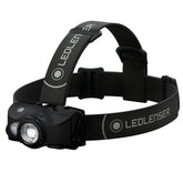 Ledlenser MH8 headlamp front view showing bright beam for outdoor visibility