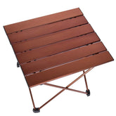 LFGUD portable camping table in use on a picnic keeps foods stable.