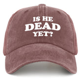 liabiliies Is He Dead Yet Hat in wine red worn by a woman for casual style and comfort