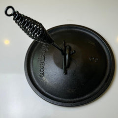 Lifespace Lid Lifter shown with Dutch oven during outdoor cooking