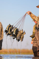 Lifetime Decoys Heyday Outdoors HangAll carabiner and stainless clips in action