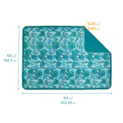 Lightspeed Outdoors XL blanket showing water-resistant base on damp grass