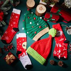 Red, green, and white Liitrsh Christmas hats and socks on display
