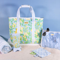 Lilly Pulitzer yellow picnic cooler side pocket stores utensils or napkins for easy reach.