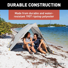 Lippert Picnic popup sun shelter showing integrated groundsheet for dirt protection.
