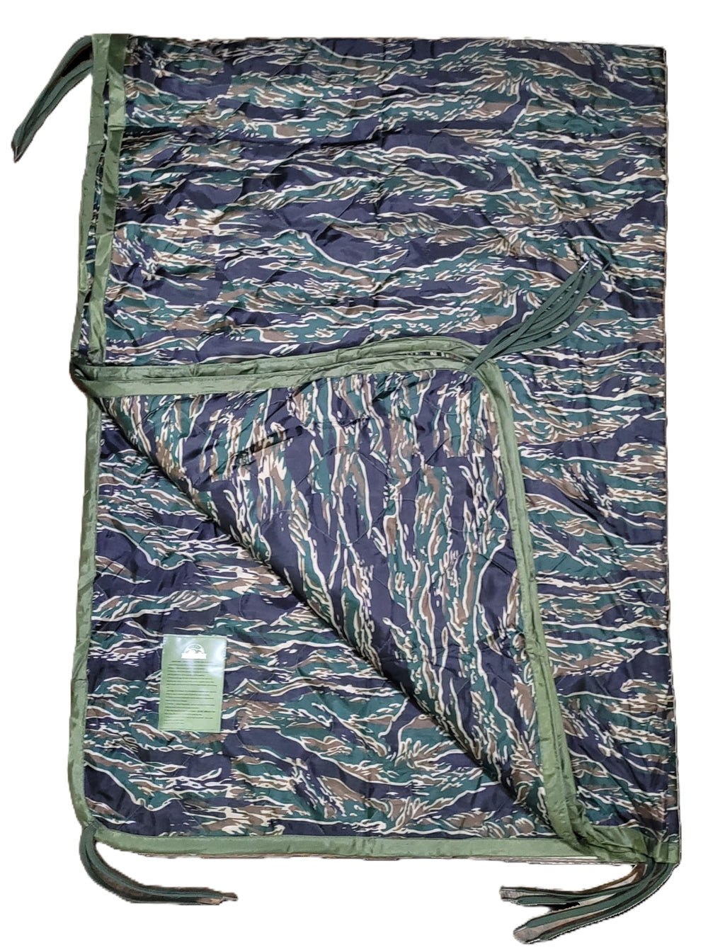 Lite Sleeper field blanket showing smart sleeve compatibility for stable pad setup outdoors