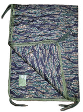 Lite Sleeper field blanket showing smart sleeve compatibility for stable pad setup outdoors
