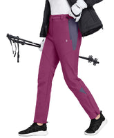 Little Donkey Andy fleece-lined softshell pants front view showing warm lining for cold-weather hiking.