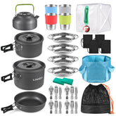 Lixada 33-piece camping cookware kit laid out for a family outdoor meal.
